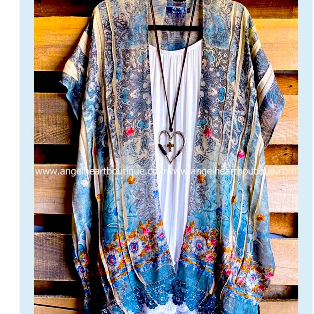 Beautiful soft Blue print kimono. Brand New. Never worn.